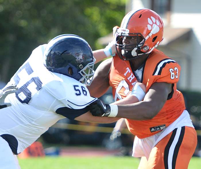 Thayer linemen Samson Okunlola (Brockton), right, during a game versus St. Mark's on Saturday, Sept. 25, 2021.